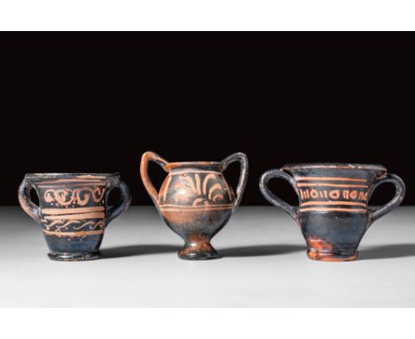 Ca. 350 - 300 BC.
A group of Xenon ware vessels. The first vessel, on the left, is a petite chalice with an elegant body and 