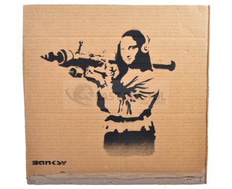BANKSY - Dismaland, 2015Mona Lisa BazookaHand sprayed stencil graffiti on cardboard Ed. 58/100Reverse in marker: smiley face 