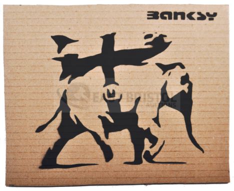 BANKSY - Dismaland, 2015Heavy WeaponryHand sprayed stencil graffiti on cardboard Ed. 72/100Reverse in marker: smiley face - E