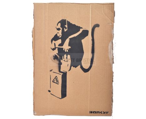 BANKSY - Dismaland, 2015Monkey DetonatorHand sprayed stencil graffiti on cardboard Ed. 55/100Reverse in marker: smiley face -