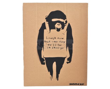 BANKSY - Dismaland, 2015Laugh Now But One Day We'll Be In ChargeHand sprayed stencil graffiti on cardboard Ed. 24/100Reverse 