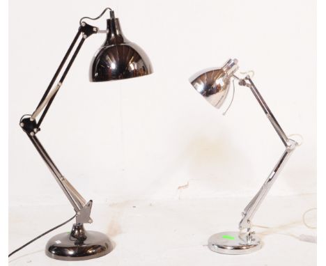 Two contemporary Anglepoise desk table light lamps. With dual spring loaded arms, on a circular base with an ebonised chrome 