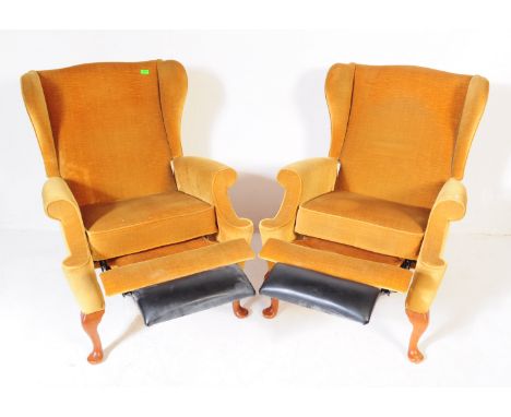 Parker Knoll - A pair of vintage retro mid 20th century Parker Knoll wing back armchairs upholstered in a mustard yellow velv