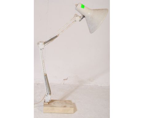 A retro vintage mid 20th century Anglepoise industrial desk lamp light. Having conical shade with white metal arms on a weigh