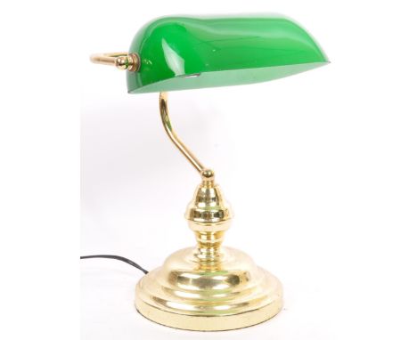 A vintage 20th century gilt metal &amp; glass banker's style desk top table lamp light with a green dome shaped glass shade o