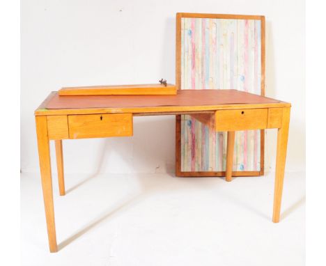 A pair of retro vintage mid 20th Century Air Ministry light oak writing tables / desks. Each comprising of a large top with l