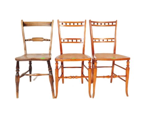 Three mid 20th century dining chairs. The lot consisting a country oak dining chair with turned and carved gallery back rest 