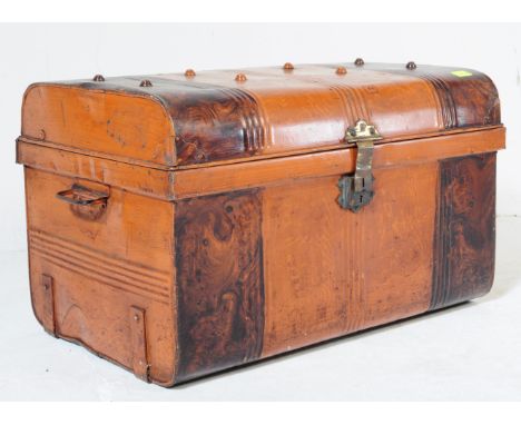 A vintage 20th century travel tin metal suitcase trunk. Of rectangular form with hinged lid opening to reveal a spacious inte