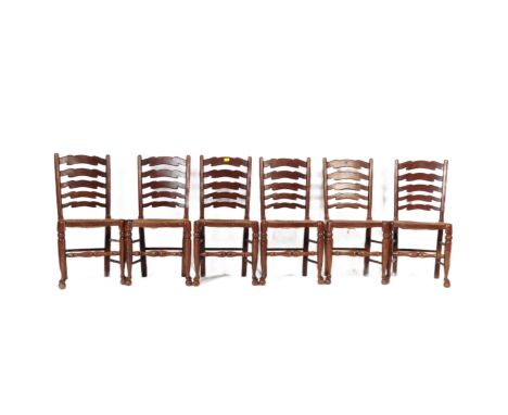 A group of six vintage 20th century, north country oak & rattan ladder back dining chairs. Having shaped slatted backs on a r