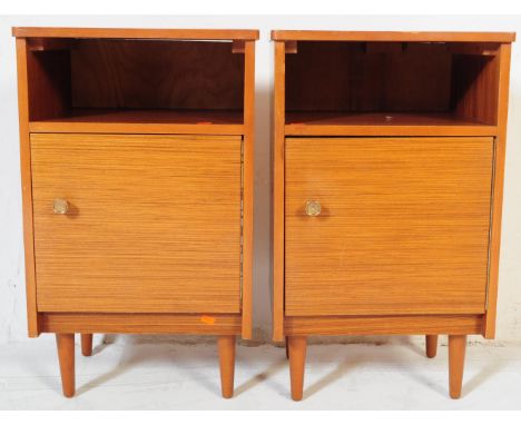 A pair of retro vintage mid 20th century teak wood bedside cabinet / tables. Of square form with pigeon hole to top with sing