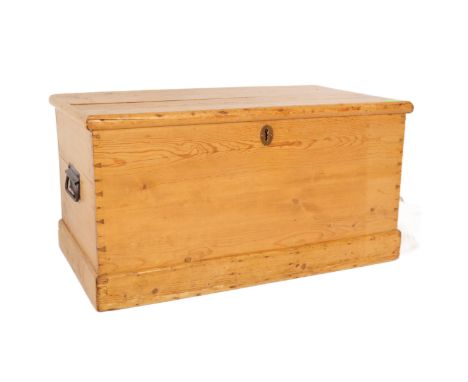 A Victorian 19th century country pine blanket box chest. Of typical rectangular form with plinth banded base, plain panel sid