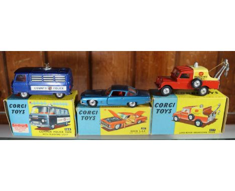 3 Corgi Toys. Ghia L.6.4 (241). In metallic blue with red interior. Land Rover Breakdown Truck (417). In red with yellow tin 