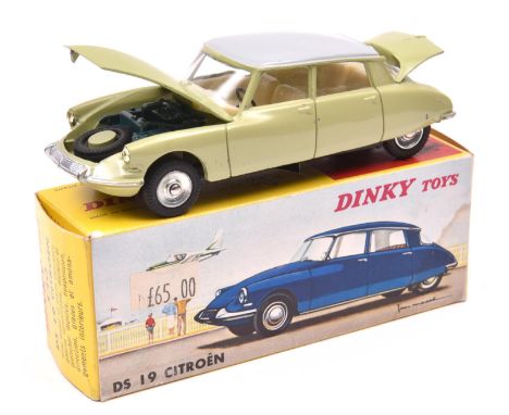 French Dinky Toys Citroen DS19 (530). A late example in light lime green with light grey roof, window glazing, cream interior