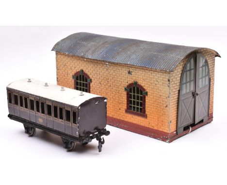 A Bing Gauge One single road engine shed in brick effect, finished in cream and brown with a blue-grey corrugated roof and do