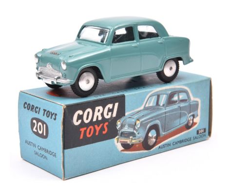 Corgi Toys Austin Cambridge Saloon (201). An example in turquoise with smooth spun wheels and black tyres. Boxed. Vehicle Min