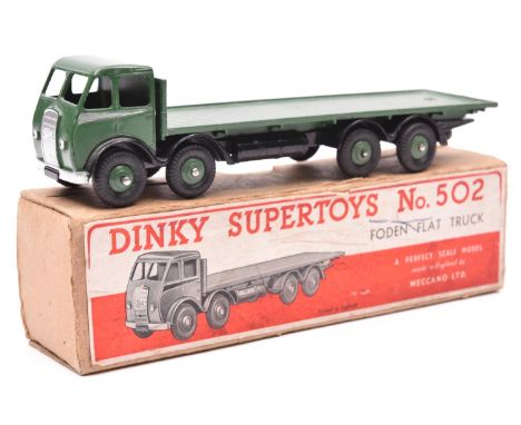 Dinky Supertoys Foden Flat Truck (502). 1st type with DG cab, cab and rear body in dark green with silver flash to cab, black