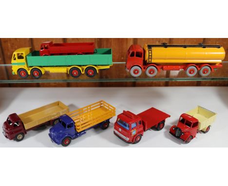7 well restored Commercial Dinky Toys. Foden FG Petrol Tanker. Cab and chassis in orange with orange wheels with yellow tank.