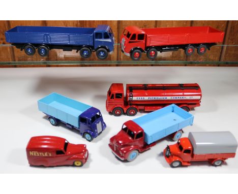 7 well restored Commercial Dinky Toys. Leyland Octopus Tanker, in red ESSO livery. 2x Foden DG 8-Wheel Wagons- one in red wit