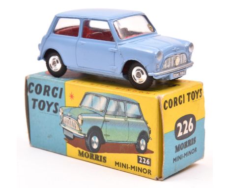 Corgi Toys Morris Mini Minor (226). In lilac with red interior, dished spun wheels with black tyres. Boxed, minor pen marking