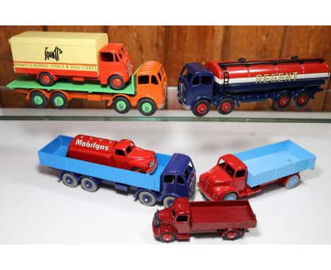 7 well restored Commercial Dinky Toys. Foden FG Tanker, Regent red, blue and white livery. Foden FG Flatbed with orange cab a