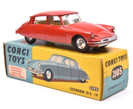 Corgi Toys Citroen D.S. 19 (210S). Example with suspension, in bright red with yellow interior, dished spun wheels and black 