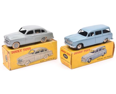 2 French Dinky Toys. Peugeot 403 Familiale (24F) in pale blue with plated ridged wheels and black tyres. Plus a Ford Vedette 
