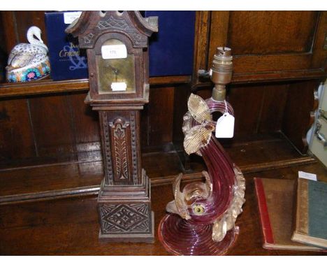 A miniature longcase clock, together with a Murano table lamp 