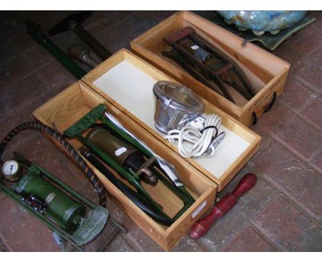 Three vintage foot pumps, together with other automobilia  
