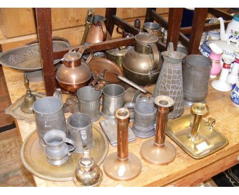 A collection of copper and brass, together with four vintage wooden bowls 