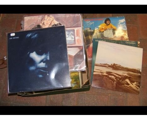 A collection of vintage LP vinyl records, including Supertramp 