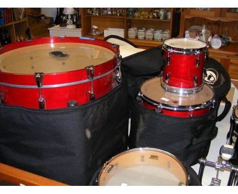 A Pearl Masters drum kit with cases, comprising base drum, snare drum, four graduated tom-toms, together with base drum pedal