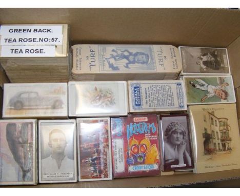 A box of vintage cigarette cards 