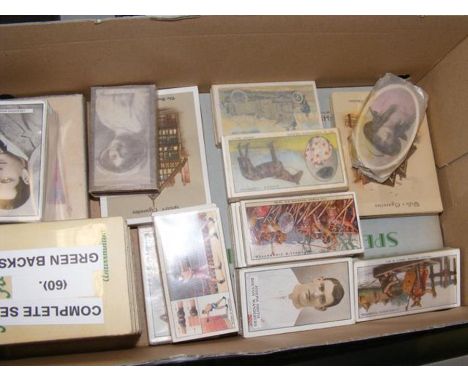 A box of vintage cigarette cards 
