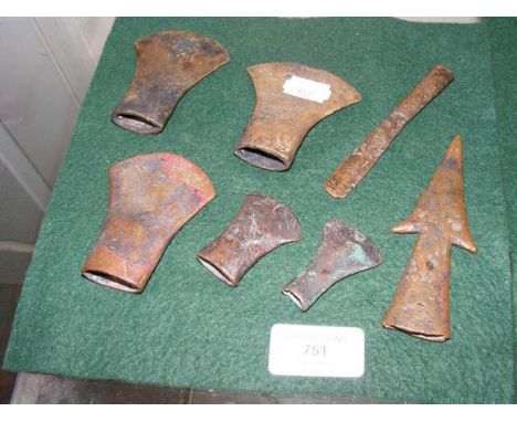 Seven antiquarian metal axe heads, etc. 
