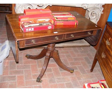 A Regency sofa table with two drawers to the apron on swept support 