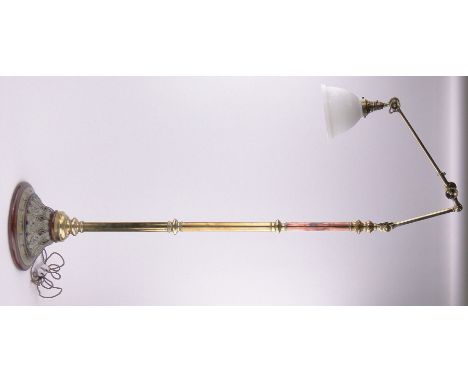 A Victorian floor standing Doulton Lambeth ceramic and brass standard lamp,with domed relief decorated foot, adjustable arm a
