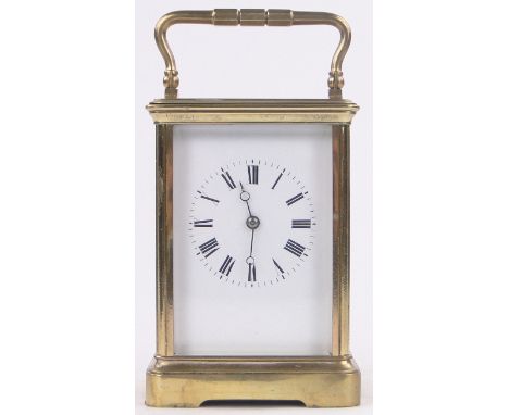 A French brass cased carriage clock circa 1900,with enamelled dial, case height 5.25", working order.