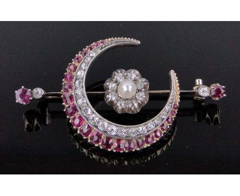 An Edwardian ruby diamond and peal set crescent and star design brooch,circa 1900, unmarked gold settings, length 53mm
