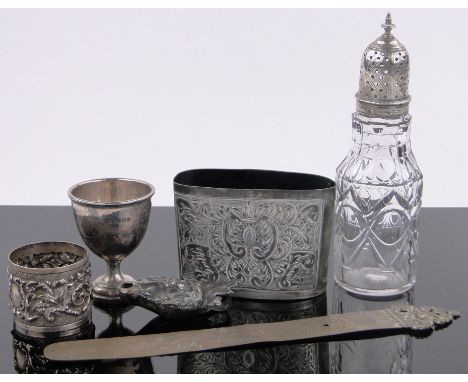 A group of English and continental silver items,including a miniature unmarked mask design oil lamp, length 6.5 cm, cut-glass