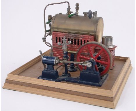 A Bing live steam powered model stationary engine,circa mid 20th century mounted on wooden plinth, width 11.5".