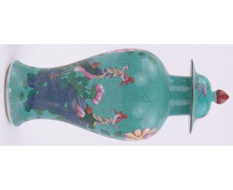 A Chinese turquoise glazed porcelain vase and cover,with enamel bird and blossom design, height 11.5".