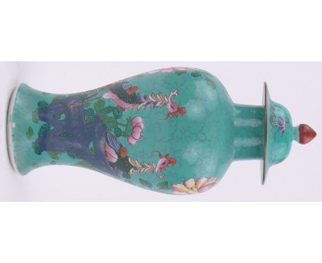 A Chinese turquoise glazed porcelain vase and cover,with enamel bird and blossom design, height 11.5".