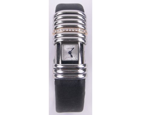 A lady's Cartier Declaration wristwatch,titanium 18ct gold and stainless steel case, ref: 2611, serial no. 65421CE, case moun