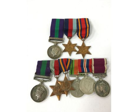 A bar of six WWII Service medals including Palestine Campaign and Regular Army together with a bar of three General Service W