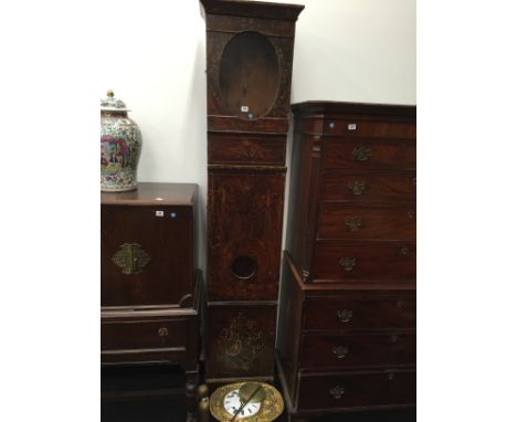 A large hand painted French long case clock with enamelled clock face heavily gilded and painted surround.