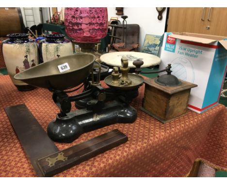 Two pairs of brass and cast iron scales and weights together with a coffee grinder, small collection of brass bells and other
