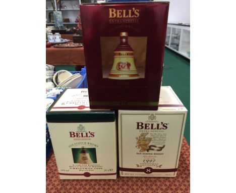 Three Bells Old Scotch Whisky Wade decanters and contents: Christmas 1996, 1997 and 1998, all in original boxes.