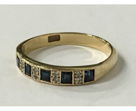 A 9 carat gold sapphire and diamond set half eternity ring (size K).
(R16)