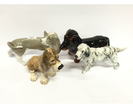 A Lladro china figure modelled as a Dog looking at its tail together with a Beswick china model of a Dachshund, Royal Doulton