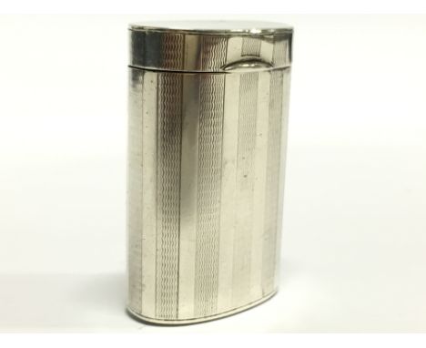 An early 20th century engine turned silver Asprey Vesta case.